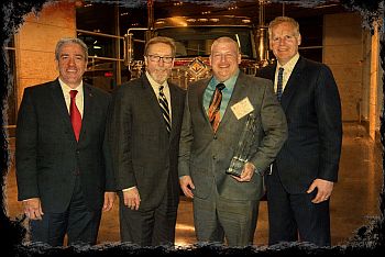 Dale Briggs, President Imperial Express, Inc. Receiving Diamond Supplier Award from Navistar 